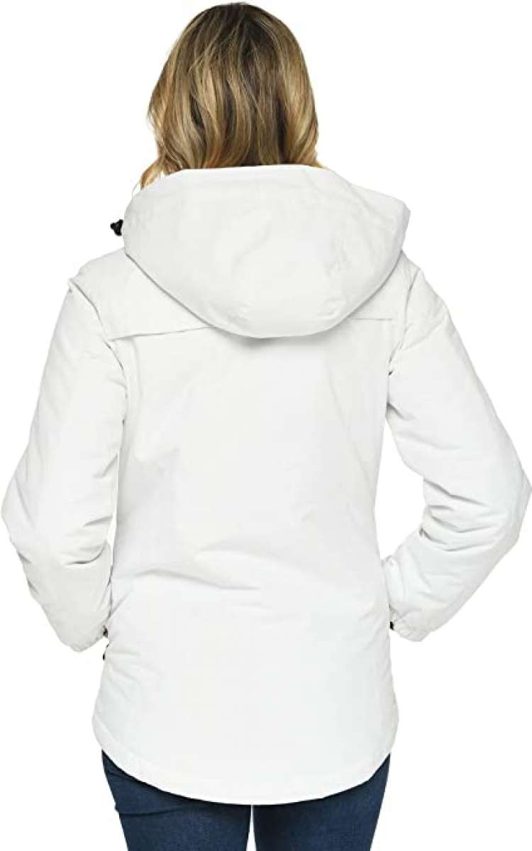 Arctix Women's Daybreak Insulated Jacket 2023 - A white puffer jacket with a hood, worn by a woman with blonde hair and dark jeans.