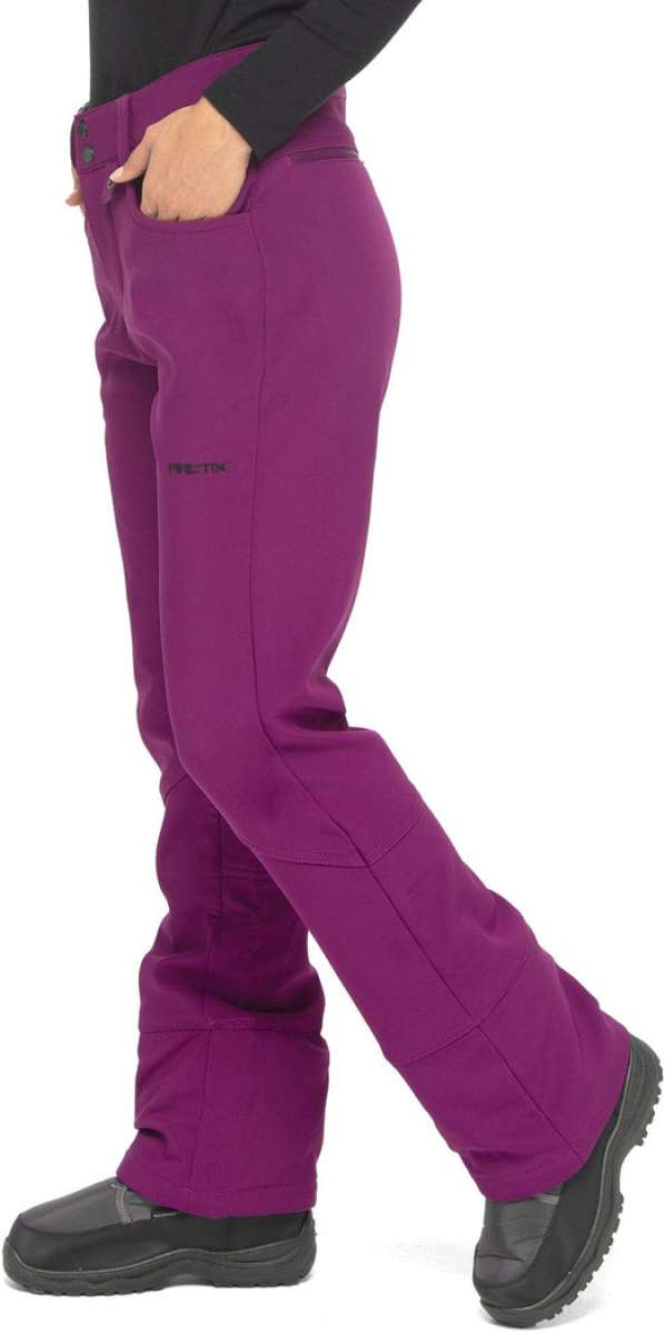 Arctix Ladies Sarah Softshell Pant 2023 - A pair of purple snow pants with a black logo on the left leg.