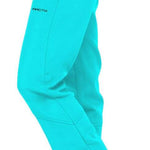 Arctix Ladies Sarah Softshell Pant 2023 - A pair of bright turquoise snow pants with a black logo on the left leg, featuring two pockets and a zippered pocket on the right side.