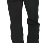 Arctix Ladies Sarah Softshell Pant - Black pants with two zippered pockets on the back, one on each side.