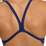 Arena Women's Kikko Pro Challenge Back One Piece Swimsuit - A navy blue one-piece swimsuit with a geometric pattern on the sides and straps.