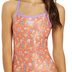 Arena Women's Lydia Jacoby Simone Manuel Challenge Back One Piece Swimsuit - A coral-colored one-piece swimsuit with a floral pattern of white, yellow, and blue flowers.