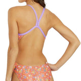 Arena Women's Lydia Jacoby Simone Manuel Challenge Back One Piece Swimsuit - A coral-colored one-piece swimsuit with a floral pattern of white, yellow, and blue flowers.