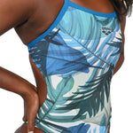 Arena Women's Lydia Jacoby Simone Manuel Challenge Back One Piece Swimsuit - A blue and white one-piece swimsuit with a tropical leaf pattern on the front, featuring a high-cut leg and a low back.