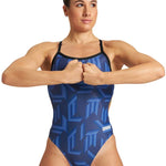 Arena Women's Puzzled Challenge Back One Piece Swimsuit - A blue one-piece swimsuit with a geometric pattern of light and dark blue lines, featuring a high-cut leg and thin straps.