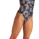 Arena Women's Puzzled Light Drop Back One Piece Swimsuit - A black one-piece swimsuit with a geometric pattern of white lines and shapes.