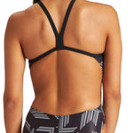 Arena Women's Puzzled Light Drop Back One Piece Swimsuit - A black one-piece swimsuit with a geometric pattern of white lines and shapes, featuring a light drop back design.