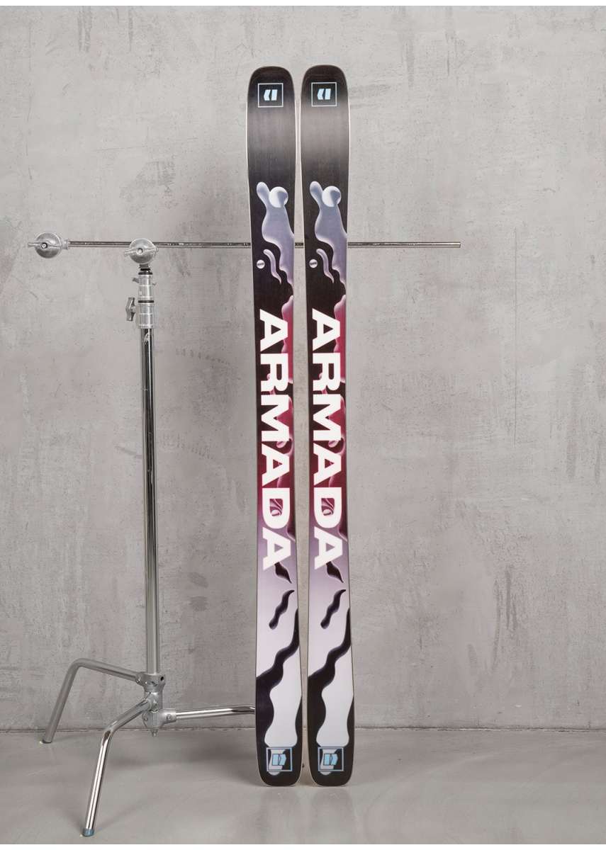Armada Women's ARW 94 Skis 2024 - Black skis with white and red lettering, featuring a woman in action on the top of each ski.