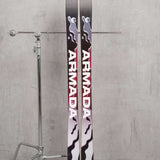 Armada Women's ARW 94 Skis 2024 - Black skis with white and red lettering, featuring a woman in action on the top of each ski.