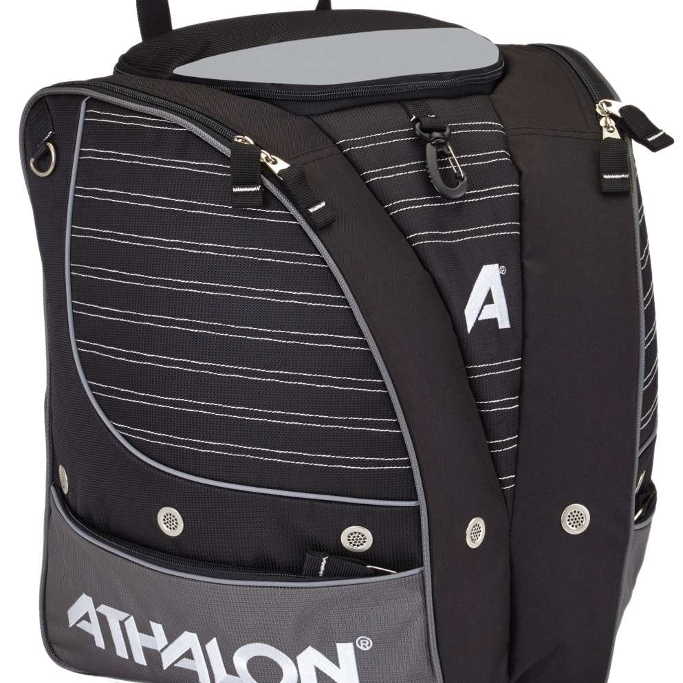 Athalon Tri-Athalon Boot Bag 2022-2023 - A black boot bag with white stripes and a gray bottom, featuring a zippered top and two side pockets.