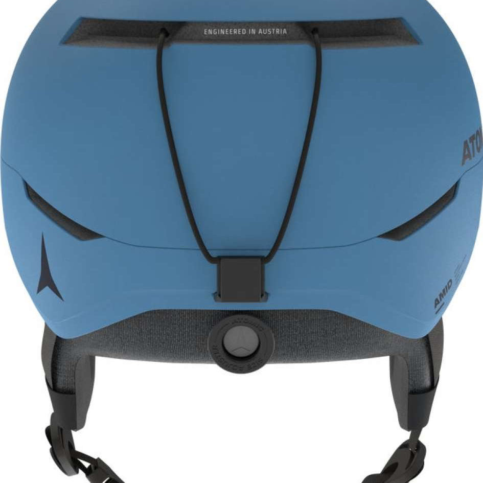 Atomic Four Amid Helmet 2024 - A matte blue helmet with a black chin strap and a small logo on the left side.