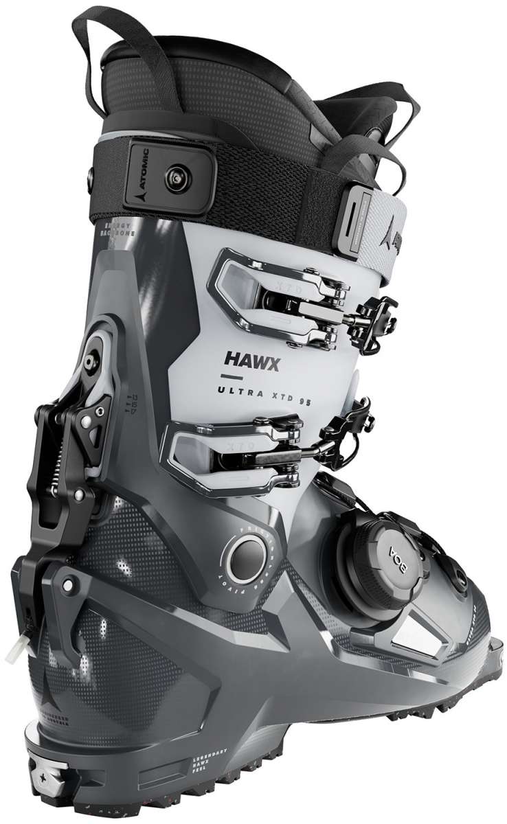 Atomic Ladies Hawx Ultra XTD 95 BOA - A white and black ski boot with a distinctive silver buckle on the side, featuring a textured pattern on the toe area.