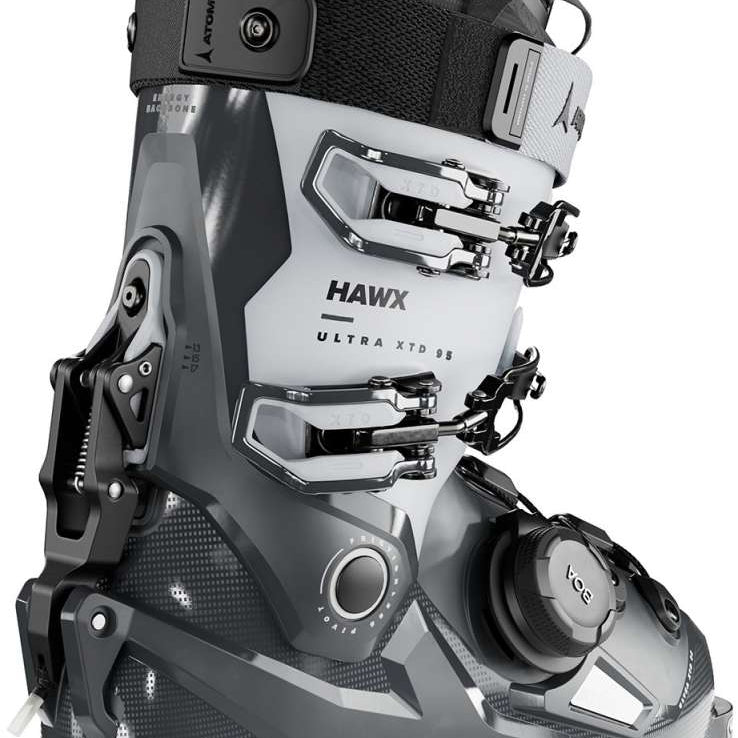 Atomic Ladies Hawx Ultra XTD 95 BOA - A white and black ski boot with a distinctive silver buckle on the side, featuring a textured pattern on the toe area.