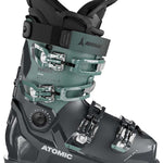 Atomic Women's Hawx Ultra 95 S Ski Boots 2023-2024 - A pair of women's ski boots with a teal-green upper and black soles, featuring silver buckles.