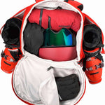 Atomic RS 30L Backpack - A red backpack with a zippered front pocket and two side pockets, featuring black straps and buckles.