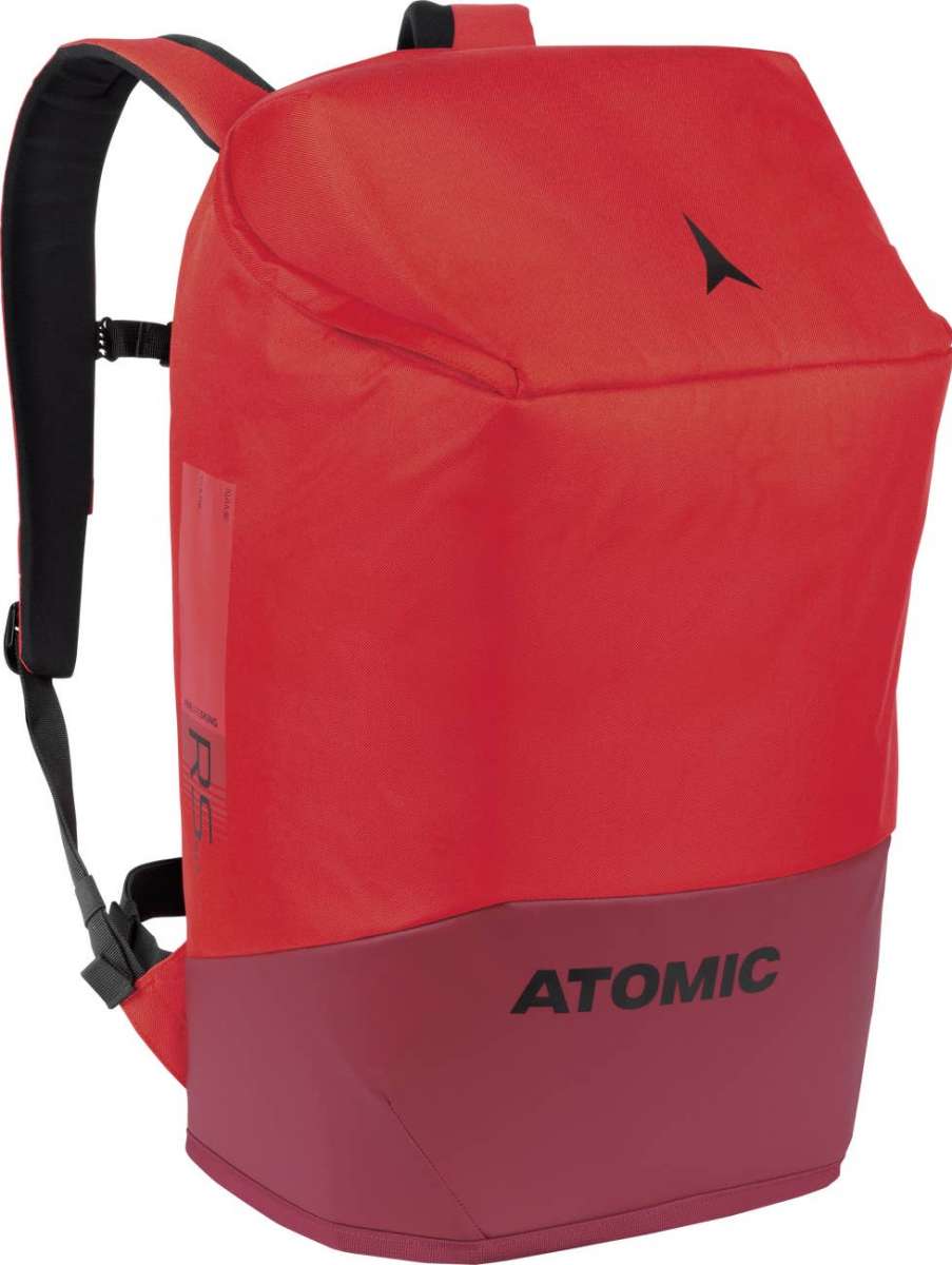 Atomic RS 50L Backpack - A red backpack with a black strap and zipper, featuring a zippered pocket on the front.