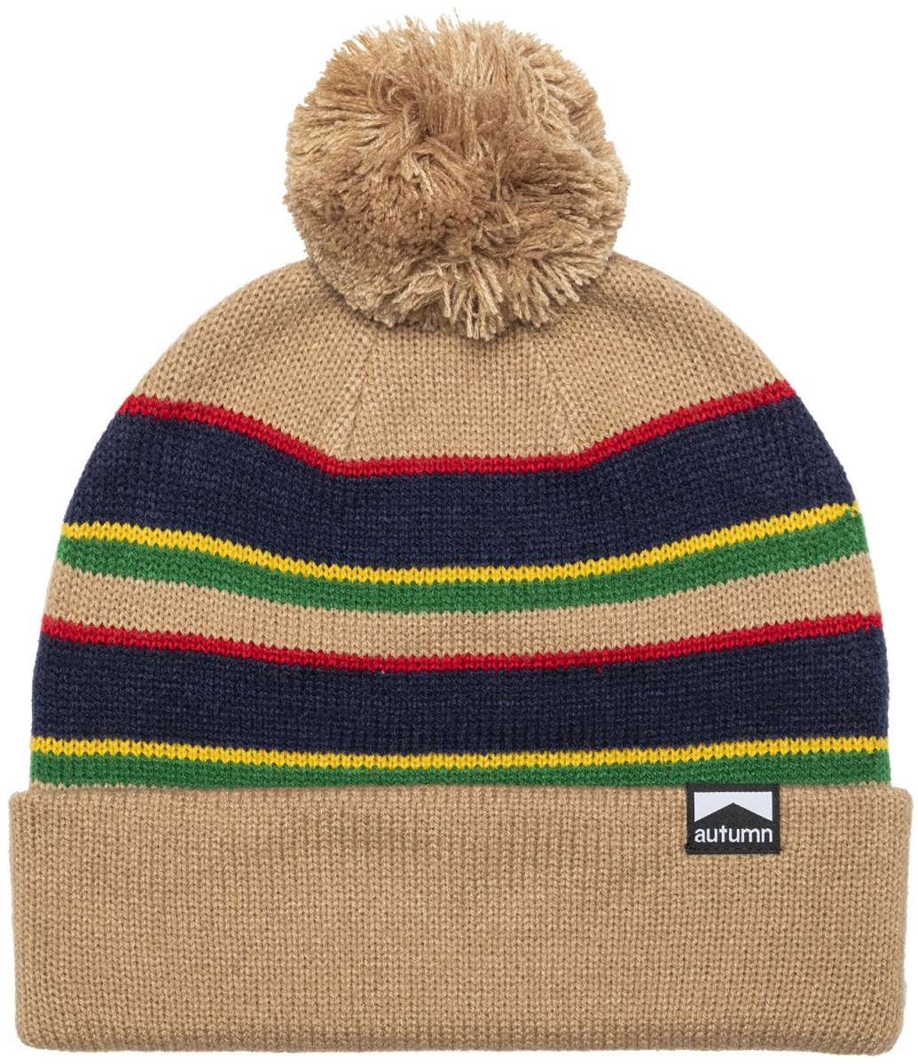 Autumn Surplus Bradford Beanie 2023 - A tan beanie with a pom-pom on top and horizontal stripes in navy, red, yellow, green, and light brown.