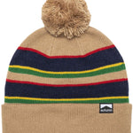 Autumn Surplus Bradford Beanie 2023 - A tan beanie with a pom-pom on top and horizontal stripes in navy, red, yellow, green, and light brown.