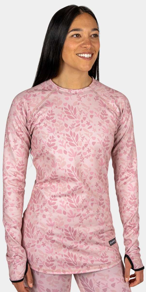 BlackStrap Cloudchaser Crew Top Baselayer 2024 - A pink crew-neck top with a subtle floral pattern and black accents on the cuffs.