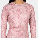 BlackStrap Cloudchaser Crew Top Baselayer 2024 - A pink crew-neck top with a subtle floral pattern and black accents on the cuffs.