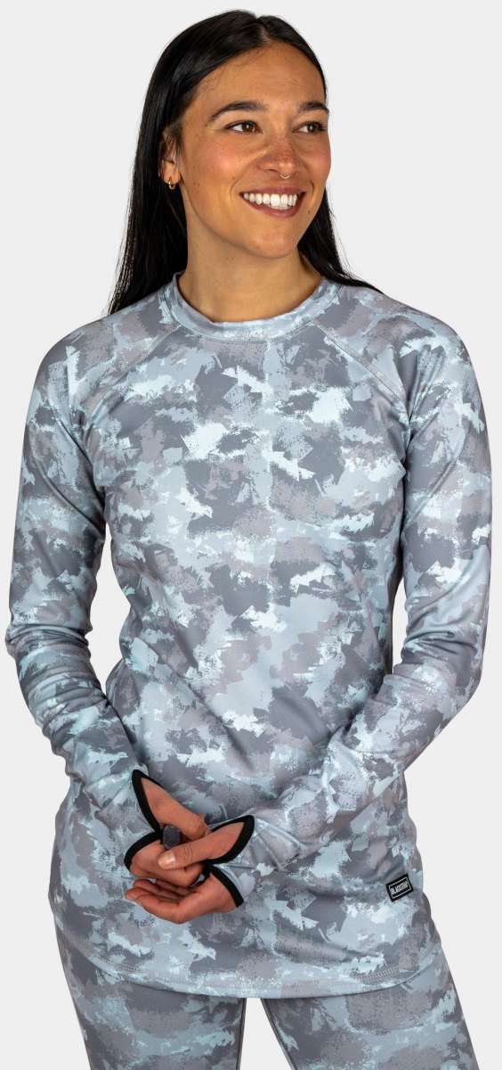 BlackStrap Cloudchaser Crew Top Baselayer 2024 - A light blue and grey crew neck top with a cloud-like pattern.