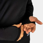 BlackStrap Cloudchaser Crew Top Baselayer 2024 - A black crew-neck top with a subtle white logo on the left chest and a small tag on the bottom right side.