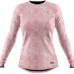 BlackStrap Cloudchaser Crew Top Baselayer 2024 - A pink crew-neck top with a repeating pattern of small, stylized leaves and flowers in various shades of pink.