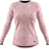 BlackStrap Cloudchaser Crew Top Baselayer 2024 - A pink crew-neck top with a repeating pattern of small, stylized leaves and flowers in various shades of pink.