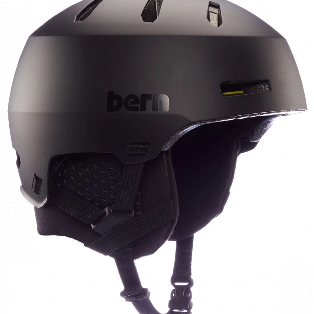 Bern Junior Macon 2.0 MIPS Helmet - A matte black helmet with a sleek, aerodynamic design and ventilation holes on top.