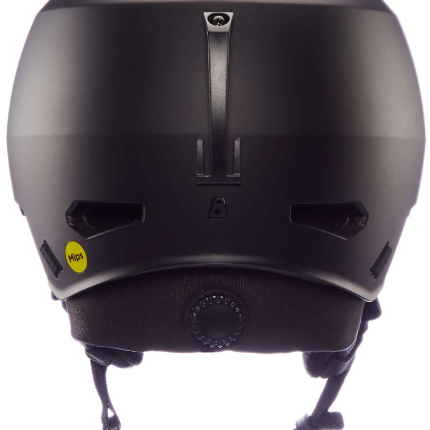 Bern Junior's Macon 2.0 - MIPS helmet with a matte black finish and white accents on the front, featuring ventilation holes along the top edge.