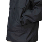 Beyond Medals Anorak 2L Shell Jacket 2024 - A black jacket with a zippered chest pocket and adjustable cuffs.