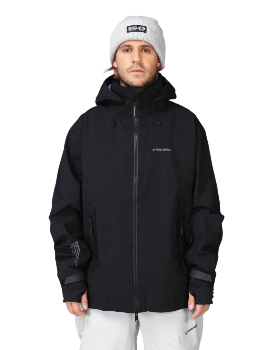 Beyond Medals High Tech 3L Shell Jacket 2024 - A black jacket with a high collar and zippered pockets.