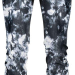 BlackStrap - A pair of black and white tie-dye patterned leggings with a high waistband, featuring a drawstring and elastic cuffs at the ankles.