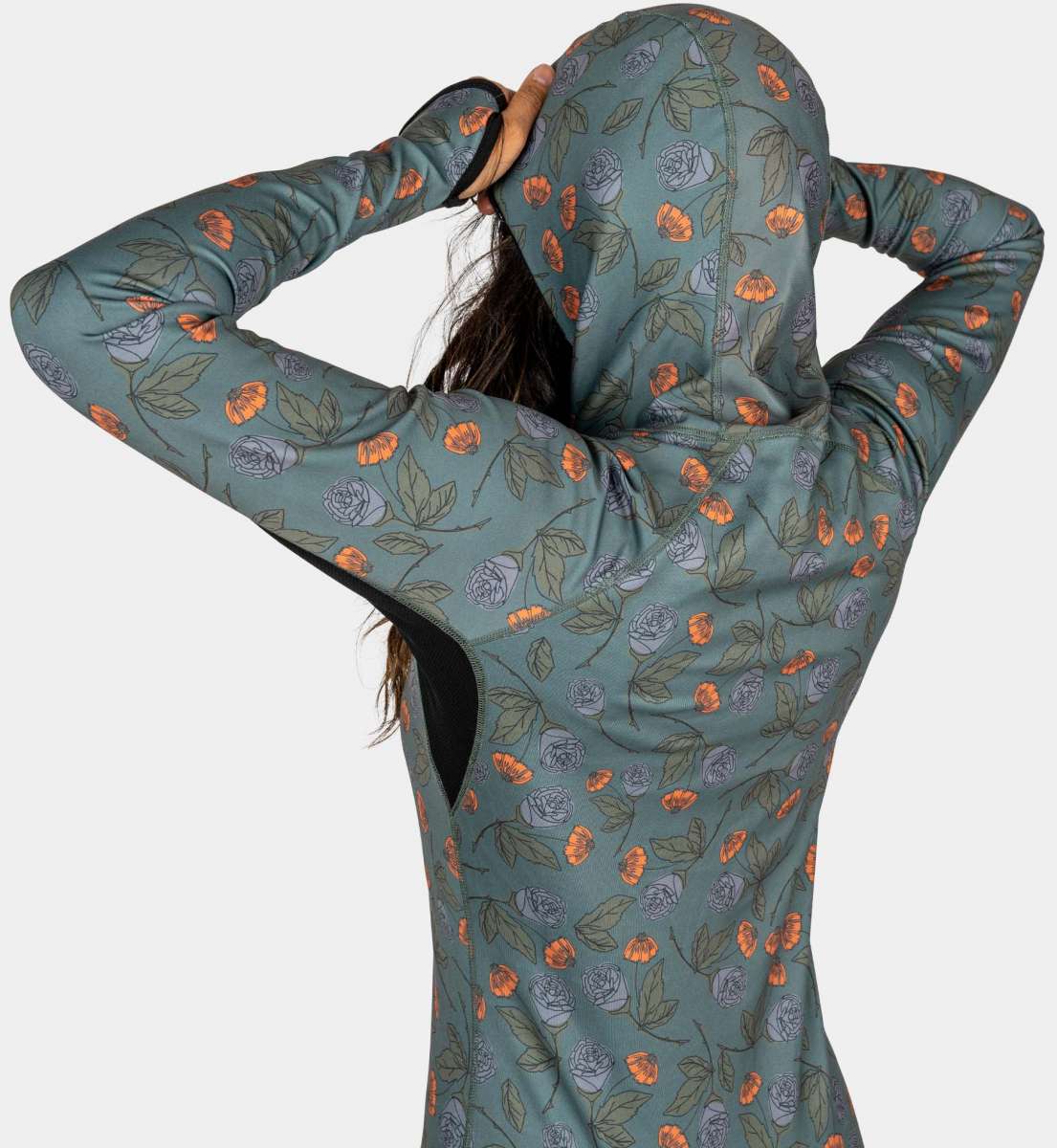 BlackStrap Women's Cloudchaser Hoodie 2024 - A black hoodie with a white and orange logo on the chest, featuring a woman wearing it from behind.