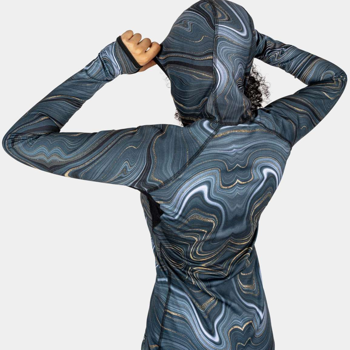 BlackStrap Women's Cloudchaser Hoodie 2024 - A black hoodie with a marbled pattern of white, grey and gold swirls.