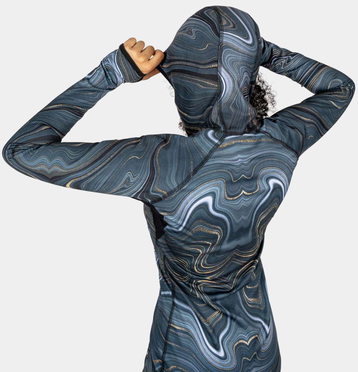 BlackStrap Women's Cloudchaser Hoodie 2024 - A black hoodie with a marbled pattern of white, grey and gold swirls.