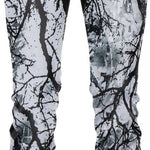 BlackStrap Summit Bottom Baselayer 2024 - A pair of black and white snowboard pants with a pattern of dark branches on a light background.