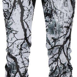 BlackStrap Summit Bottom Baselayer 2024 - A pair of black and white snowboard pants with a pattern of dark branches on a light background.