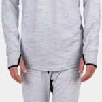 BlackStrap Summit Bottom Baselayer - A man wearing a black baselayer with a crew neck and long sleeves, paired with matching black pants featuring an elastic waistband.