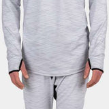 BlackStrap Summit Bottom Baselayer - A man wearing a black baselayer with a crew neck and long sleeves, paired with matching black pants featuring an elastic waistband.