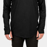 BlackStrap Summit Bottom Baselayer - A man wearing a black turtleneck sweater and gray beanie, showcasing the baselayer bottoms on his lower half.