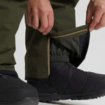 Burton AK GORE-TEX Cyclic Pant 2023 - Dark green waterproof pants with a zippered ankle cuff and elastic waistband.