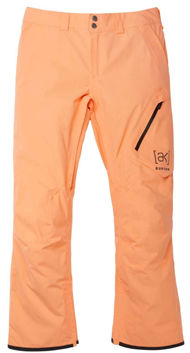 Burton AK GORE-TEX Cyclic Pant 2023 - A pair of light orange snow pants with a black zipper on the right thigh.