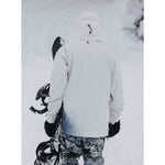 Burton AK GORE-TEX Cyclic Pant 2023 - A black and white snowboard pant with a subtle pattern of thin, dark lines on a light background.