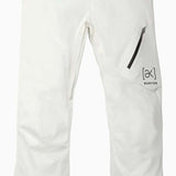 Burton AK GORE-TEX Cyclic Pant 2023 - White snow pants with a black stripe on the left leg, featuring a zippered pocket and adjustable cuffs.