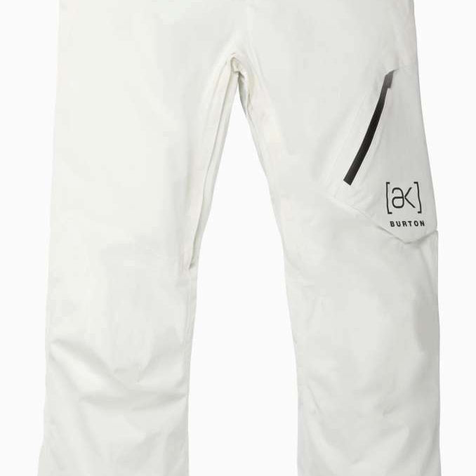 Burton AK GORE-TEX Cyclic Pant 2023 - White snow pants with a black stripe on the left leg, featuring a zippered pocket and adjustable cuffs.