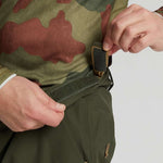 Burton AK GORE-TEX Cyclic Pant 2023 - Dark green snow pants with a subtle pattern of thin, darker stripes on the side and back pockets.