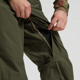 Burton AK GORE-TEX Cyclic Pant 2023 - Dark green pants with a zippered fly and black zipper pull.