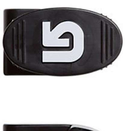 Burton Board Wall Mounts - Black wall mount with two holes for hanging boards, featuring a small metal screw in one hole.