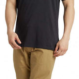 Burton Durable Goods Short Sleeve T-Shirt 2023 - A black t-shirt with yellow lettering and a white logo on the chest.